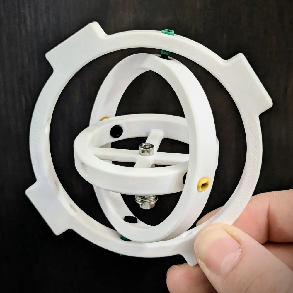 A 3d printed gimbal mechanism made with the BIC pencil pivots