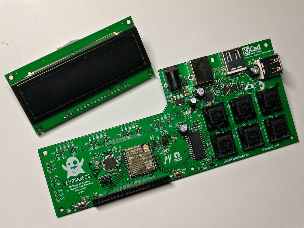 An L shaped circuit board with six large mechanical keys, a few USB ports, and a large display.
