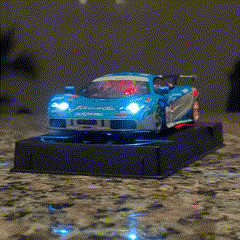 Photo of LumiRace powering the lights in a slot car